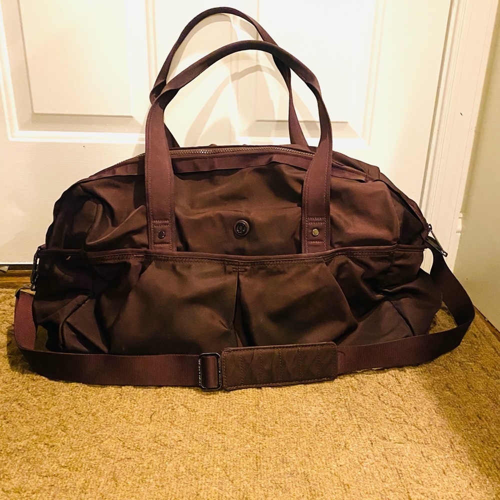 Lululemon gym duffel in purple.